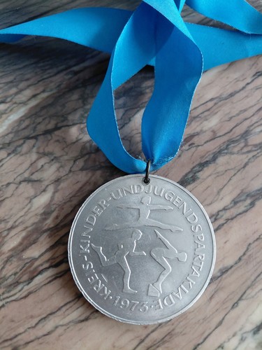 Medaille kinder und jugend - und,
