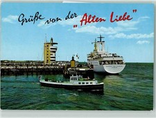 39208842 - 2190 Cuxhaven Alte Liebe mit Radarturm und Seebaederschiff Barkasse