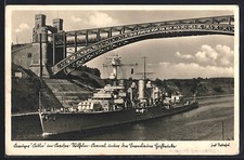 AK Kiel, Kreuzer Köln im Kaiser-Wilhelm-Kanal unter der Levensauer Hochbrücke 