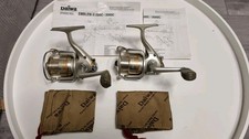 2x Stationärrolle Daiwa Emblem-X2000C