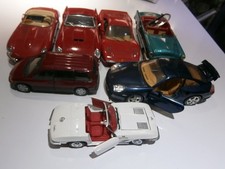 SIEBEN MODELLAUTOS  ALS ESATZTEILSPENDER  1:18+1:24  DEFEKT KLEINTEILE FEHLEN ,,