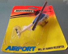 80er MATCHBOX AIRPORT, ungeöffnet im BLISTER BELL JET RANGER Helicopter NEU OVP