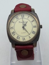 Xin Feng Damenuhr,Herrenuhr,Armbanduhr,rotes Lederband,die Uhr läuft