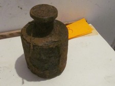 ein sehr rostiges Gewicht f