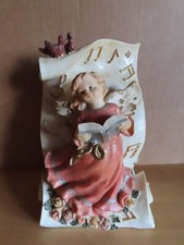 Figur Spieluhr Engel vor einer