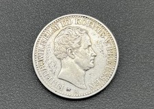 900/- Silbermünze, Ein