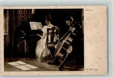 10076187 - Frau am Klavier und Sohn spielt Cello AK Klavier Spinett