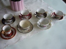 7 verschiedene Mokkatassen mit Unterteller