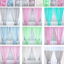 Vorhänge mit Herzchen für