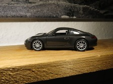 Modellauto Porsche 911 992 Schwarz Welly 1:39