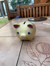 Sparschwein gold Farben