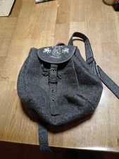 kleiner Rucksack in Lodenoptik, kariertes Futter mit Paulaner Werbeaufdruck 