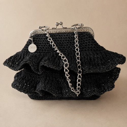Schwarze gehäkelte clutch mit - gehäkelte,