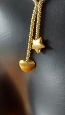 Goldkette, Gelbgold 585 mit Herz-und Sternanhänger, Karabiner, gestempelt.