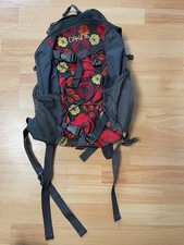 DAKINE 15 Liter Rucksack Blumenmuster rot und orange