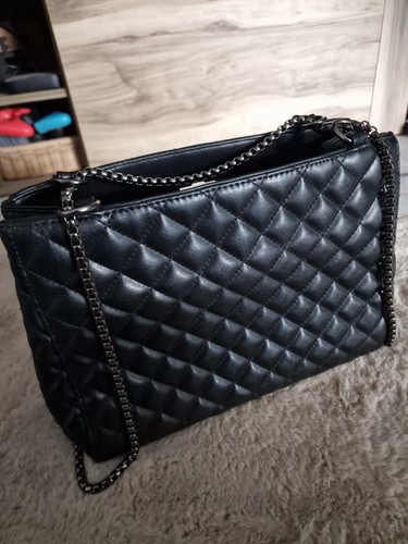 Elegante schwarze gesteppte - elegante,
