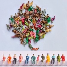 Figuren sitzende Reisende