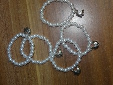 10 Stück Serviettenring Taufe Geburt Perlen weiß Kinderwagen silber Tischdeko