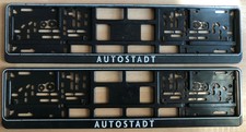 ORIGINAL 2x GEBRAUCHT VW AUTOSTADT KENNZEICHENHALTERUNGEN NUMMERNSCHILDRAHMEN