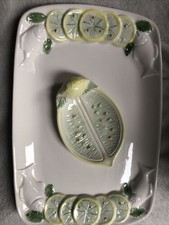 Platte servierplatte für Fisch mit Zitronen Schale