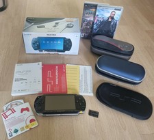 PSP Konsole 1004K Value Pack + Socom + iRobot + Sony&BB Etui + 1GB Speicherkarte