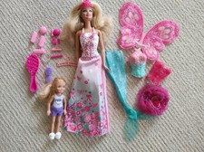 Mattel Barbie mit verschiedenen Kostümen Meerjungfrau Ballerina Flügel und Kind