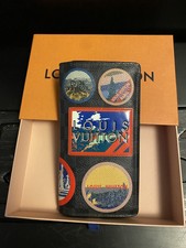 *Louis Vuitton* Damier graphite alps brazza Wallet.   LIMITIERT