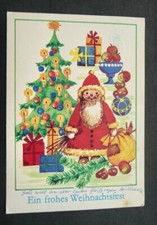 Künstler AK Weihnachten: Weihnachtsmann + Tannenbaum, DDR 1979 Planet/ Ohm
