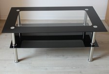 Glastisch schwarz rechteckig silberne Füße