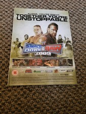 (bmj1) Werbung/Plakat 11x8" WWE Beigeschmack DOWN VS RAW 2009-Wii, Playstation 2, PSP