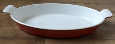 COUSANCES OVALE FLACHE SCHÜSSELPFANNE 32 cm VULKANISCH ORANGE EMAILLE GUSSEISENGRIFFE