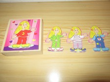 14- teiliges Holzpuzzle (Auswahlpuzzle) Mädchen, das man versch. anziehen kann