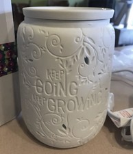 Fahren Sie weiter wachsenden Scentsy Wärmer