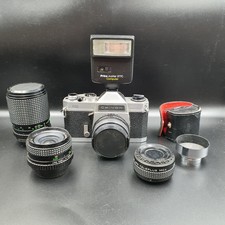 1 x Chinon 35 mm Film-Spiegelreflexkamera. Konvolut funktioniert. Körper, Objektiv, Blitz, verfolgt