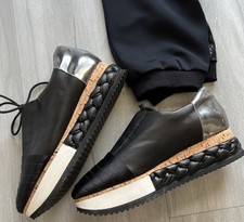 AGL Leombruni Plateau Low Top Sneaker Gr. 41 Schwarz Leder Satin Flechtdetail