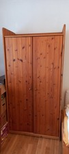 kleiderschrank holz massiv