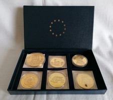 05 # 7 Medallien vergoldet international gekapselt Konvolut Afrika Amerika GB D