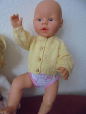 Sehr gut erhaltene Newborn-Puppe Vinyl ,süß gekleidet