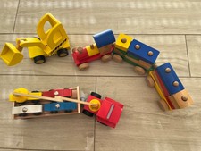 Paket Holzfahrzeuge Holzspielzeug Eisenbahn Bagger Autotransporter 