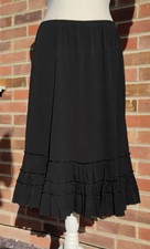 Größe 16-18 schwarz, Krepp, Rüschensaum, elastische Taille, Midi-Rock Afibel