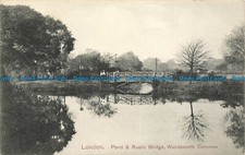 R649100 London. Pond und rustikale Brücke. Wandsworth Common. K. L