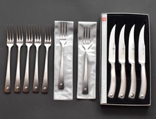 Wüsthof Culinar 4 Steakmesser und 7 Steakgabeln