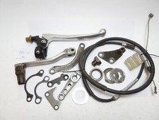 Suzuki RM 250 - diverse Kleinteile | Hebel Halterung Blech Halter Griff Pedal