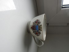 Alte Tasse. Andenkenporzellan. Neuruppin. Stadtwappen.