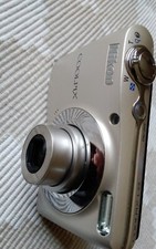 Nikon Coolpix L22 Digitalkamera - silber, Batteriefachdeckel defekt - sonst ok