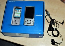 Nokia 6700 Slide in Silber & allem Zubehörpaket wie LK, OVP, Ohrhöhrer neuw. usw