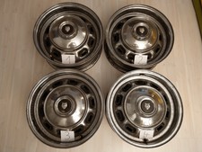 4x Jaguar Stahlfelgen 6x15 mit verchromten Radkappen