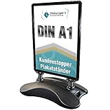 DisplayLager, Dänische Qualität - Schwarzer Plakatständer Wind-Sign | Für Postermass DIN A1 594x841 mm. Robuster Wetterfester Kundenstopper. Standgewicht für hohe Windgeschwindigkeiten und Rollen