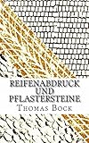 Reifenabdruck und Pflastersteine